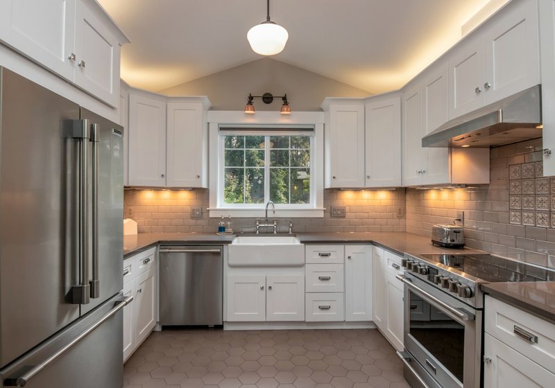 Finished kitchen renovation with white cabinets