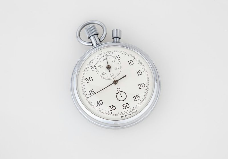 Vintage stopwatch on a plain background